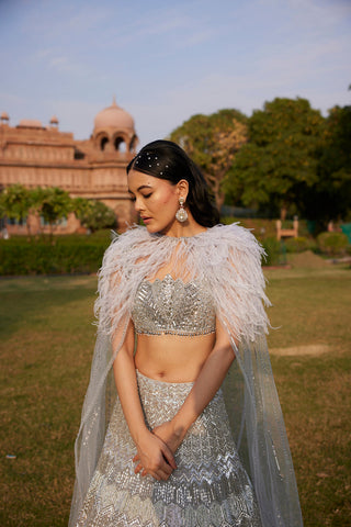 "Seher" Silver Grey Metallic Sequin & Crystal Beads Hand Embroidered Lehenga Set With Cape "Seher" Silver Grey Metallic Sequin & Crystal Beads Hand Embroidered Lehenga Set With Cape