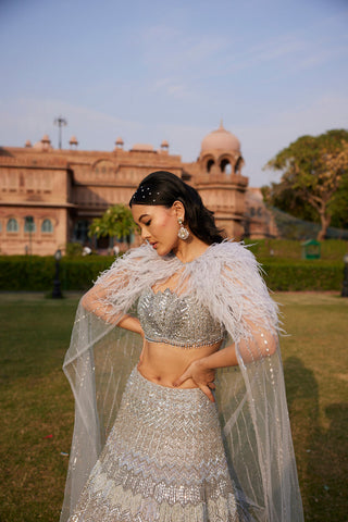 "Seher" Silver Grey Metallic Sequin & Crystal Beads Hand Embroidered Lehenga Set With Cape "Seher" Silver Grey Metallic Sequin & Crystal Beads Hand Embroidered Lehenga Set With Cape