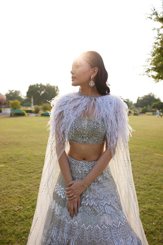 "Seher" Silver Grey Metallic Sequin & Crystal Beads Hand Embroidered Lehenga Set With Cape "Seher" Silver Grey Metallic Sequin & Crystal Beads Hand Embroidered Lehenga Set With Cape