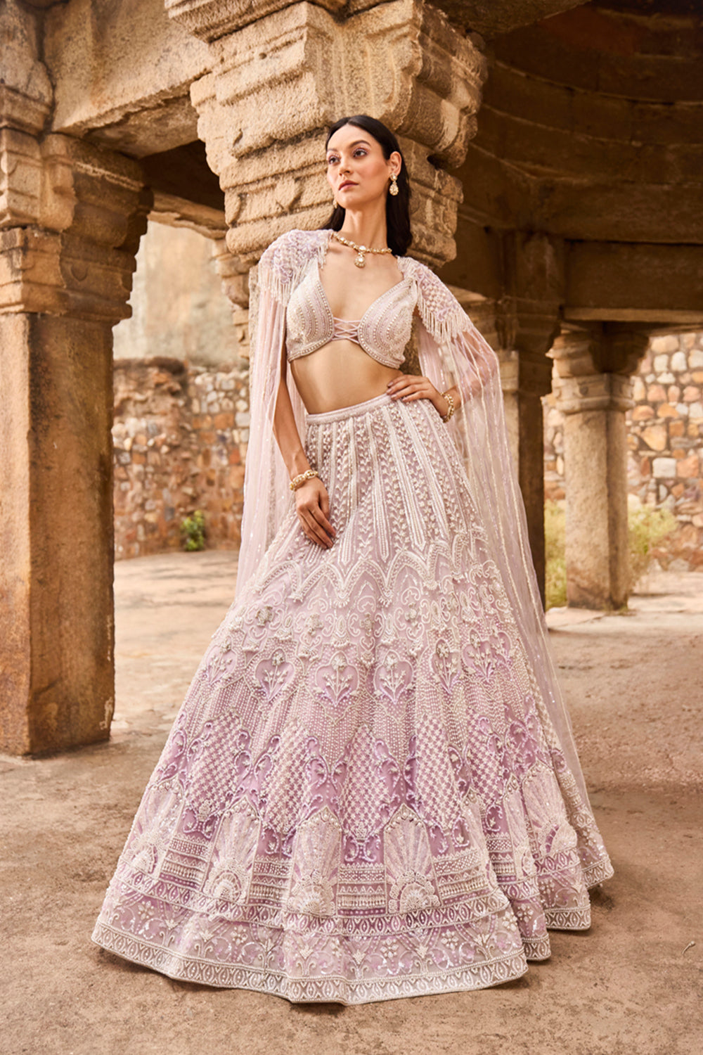 "Dhisana" Pearl Work Purple Hand Embroidered  Lehengas With Cape